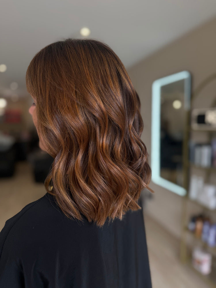 Réalisation coloration et ondulations au salon Heavenly Studio