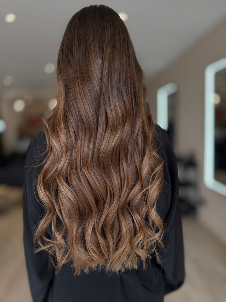 Réalisation coloration et ondulations au salon Heavenly Studio